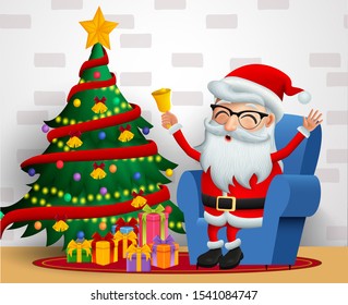 Santa claus sitting vector background design. Christmas santa claus character happy sitting in chair and holding bell with christmas tree in colorful lights, balls and gift elements in white wall.