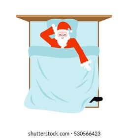 Santa Claus sleeping in bed. Rest before Christmas. Dream New Year. Man asleep
