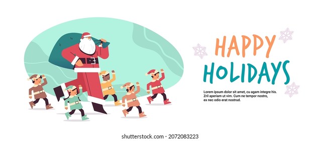 santa claus standing with mix race elves in uniform happy new year merry christmas holidays celebration concept