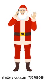 Santa Claus talking on the mobile phone greeting someone with his hand raised up. Full length portrait of Santa Claus in a flat style. Vector illustration.