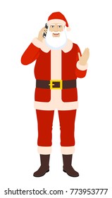 Santa Claus talking on the mobile phone and greeting someone with his hand raised up. Full length portrait of Santa Claus in a flat style. Vector illustration.
