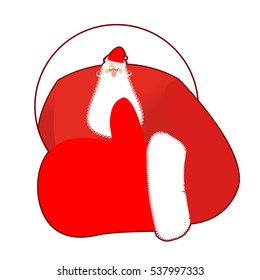 Santa Claus thumbs up. Gesture of hand is all right. Success of Christmas. Good luck in new year. Xmas template
