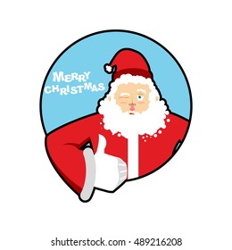 Santa Claus thumbs up well and winks. Sign all right. Merry Christmas character. Hand showing ok. Gesture of arm. Good grandfather with beard in red suit. Illustration for new year
