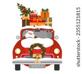 Santa delivers presents in a red retro car. Red Santa car with presents in front.