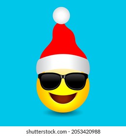 Santa emoji with red Christmas cap, vector cartoon. Happy emoticon in santa costume.