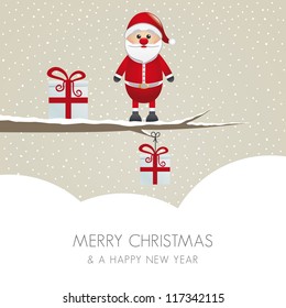 santa figure on branch snowy winter landscape