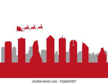santa flying over the city of dallas