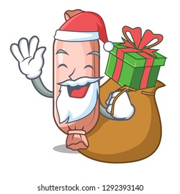 Santa with gift bolsters above on the mascot bed