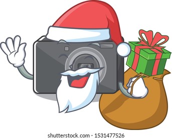 Santa with gift digital camera on a cartoon table