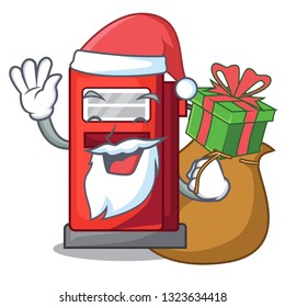 Santa with gift gosoline pump front the cartoon house