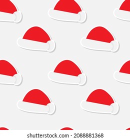 Santa hat seamless pattern. Cartoon Santa's hat. Vector cartoon pattern.