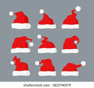 Santa hats set on grey background. Vector collection of red Santa Claus cap for holiday xmas and new year.