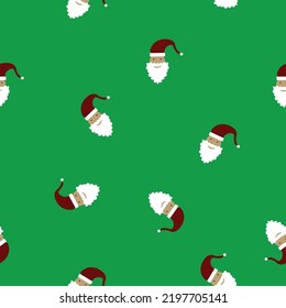 santa head pattern in green background chrismas fabric design texture xmas gift wraping