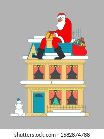 Santa on roof puts gift in chimney. Christmas and New Year. Xmas vector illustration
 
