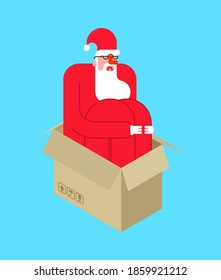 Santa sits inside box sad. Xmas Loneliness concept. end of Christmas. holiday ends. Grandfather is tucked into cardboard box

