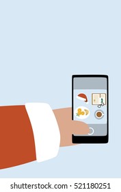Santa taking a picture with his cell phone