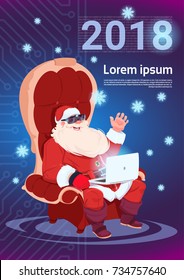 Santa Using Laptop Wear 3d Virtual Glasses Merry Christmas And Happy New Year 2018 Greeting Card Winter Holidays Concept Banner Flat Vector Illustration