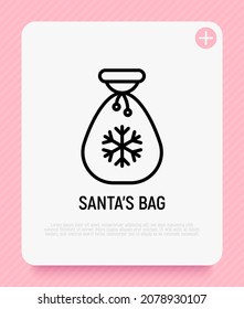 Santa's bag with snowflake thin line icon. Modern vector illustration.