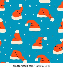 Santa`s hats vector seamless pattern. Retro, vintage style. Red Santa cap for textile print or wrapping paper. New year, Merry Christmas print design in hand drawn style