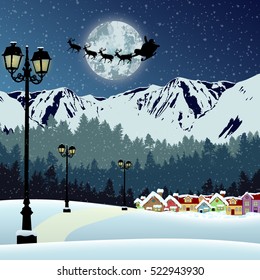 Santa's sleigh in front of full moon in beautiful snowy landscape over mountains on blue night