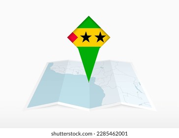 Sao Tome and Principe is depicted on a folded paper map and pinned location marker with flag of Sao Tome and Principe. Folded vector map.