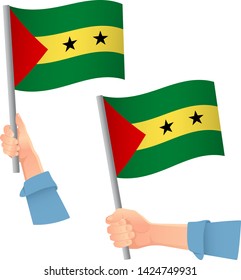Sao Tome and Principe flag in hand. Patriotic background. National flag of Sao Tome and Principe vector illustration