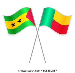 Sao Tomean and Beninese crossed flags. Sao Tome and Principe combined with Benin isolated on white. Language learning, international business or travel concept.