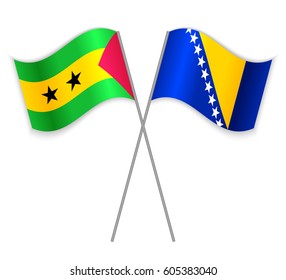 Sao Tomean and Bosnian crossed flags. Sao Tome and Principe combined with Bosnia and Herzegovina isolated on white. Language learning, international business or travel concept.