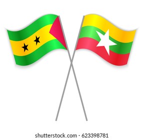 Sao Tomean and Burmese crossed flags. Sao Tome and Principe combined with Burma isolated on white. Language learning, international business or travel concept.