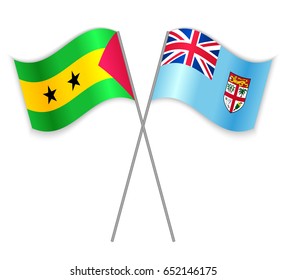Sao Tomean and Fijian crossed flags. Sao Tome and Principe combined with Fiji isolated on white. Language learning, international business or travel concept.