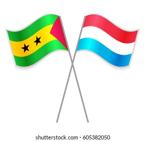 Sao Tomean and Luxembourgish crossed flags. Sao Tome and Principe combined with Luxembourg isolated on white. Language learning, international business or travel concept.