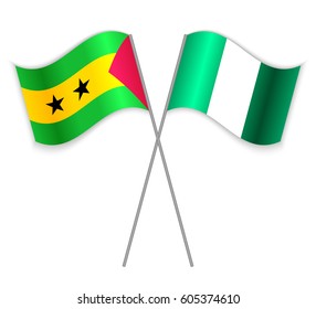 Sao Tomean and Nigerian crossed flags. Sao Tome and Principe combined with Nigeria isolated on white. Language learning, international business or travel concept.