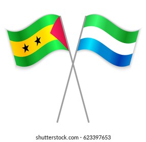 Sao Tomean and Sierra Leonean crossed flags. Sao Tome and Principe combined with Sierra Leone isolated on white. Language learning, international business or travel concept.