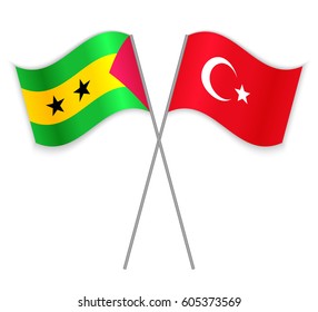 Sao Tomean and Turkish crossed flags. Sao Tome and Principe combined with Turkey isolated on white. Language learning, international business or travel concept.