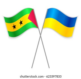 Sao Tomean and Ukrainian crossed flags. Sao Tome and Principe combined with Ukraine isolated on white. Language learning, international business or travel concept.