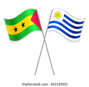 Sao Tomean and Uruguayan crossed flags. Sao Tome and Principe combined with Uruguay isolated on white. Language learning, international business or travel concept.