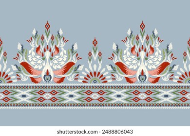 Sarong pattern.Ikat floral design pattern on blue background vector illustration.Ikat ethnic oriental embroidery.Aztec style,abstract.design for texture,fabric,clothing,wrapping,decoration,print,rug.
