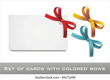  sat of blank white cards with colored bows and ribbons