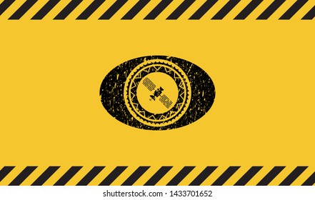 satelite icon black grunge emblem with yellow background. Vector Illustration. Detailed.
