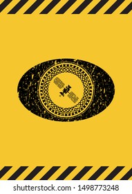 satelite icon black grunge emblem inside yellow warning sign. Vector Illustration. Detailed.