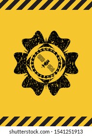 satelite icon black grunge emblem with yellow background. Vector Illustration. Detailed.