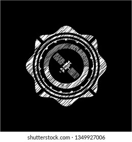 satelite icon drawn on a blackboard