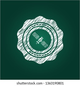 satelite icon drawn on blackboard