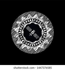satelite icon drawn on blackboard