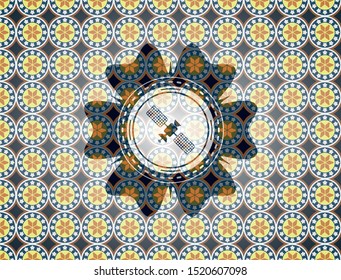 satelite icon inside arabesque badge background. arabic decoration.