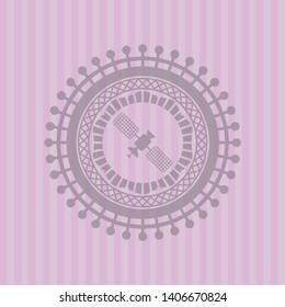 satelite icon inside badge with pink background