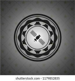 satelite icon inside black emblem
