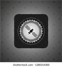 satelite icon inside black emblem