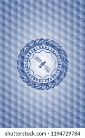 satelite icon inside blue badge with geometric background.