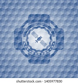 satelite icon inside blue badge with geometric pattern.